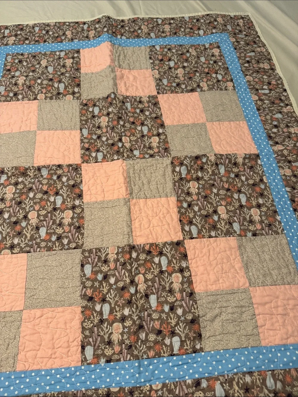 Handmade Floral Patchwork Baby Quilt with seashells in Pink, Blue & Brown